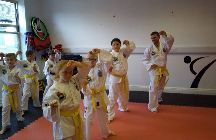 Students demonstrating Taekwondo patterns