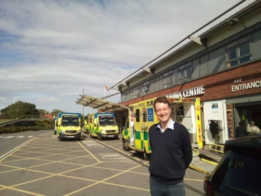 Simon with Ambulances outside James Cook University Hospital