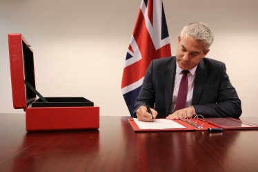 Brexit Secretary Steve Barclay signing the repeal of the European Communities Act